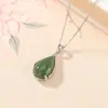 Yi Lu Yin Plata de Ley S925 Jade Hetian Esmeralda Forma de Gota de Agua Colgante Temperamento Moda Versátil Simple Nuevo Colgante Chino