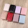 Fornecimento transfronteiriço direto da fábrica Carteira feminina doce estilo coreano, bolsa de mão curta com zíper, porta-moedas e porta-cartões simples de cor sólida