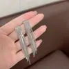 Tendência Explosiva Europeia e Americana Brincos de Franja de Metal Exagerados Design Moderno Senso de Luxo Leve Joker Joia de Orelha Exquisita Venda por Atacado
