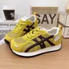 Sapatos Femininos de Verão Novos Malha Respirável Sapatos de Treino Alemães Versão Coreana 2026 Versátil Solado Plano Esportivo Casual Tênis Forrest Gump