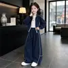 Conjunto deportivo para niñas para primavera y otoño 2026, nuevo estilo para niños mayores, top casual y pantalones de pierna ancha, un elegante conjunto de dos piezas