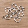 2 colores 17 * 19 mm DIY aleación de zinc joyería hueco amor colgante joyería bolsas accesorios para teléfono móvil