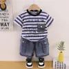 Conjunto de Ropa de Verano para Niños 2026 Nuevo Elegante Rayado con Bolsillo Manga Corta Conjunto de Dos Piezas Ropa Casual para Bebé Moda Infantil