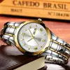 Reloj al por mayor resistente al agua no mecánico para hombre transmisión en vivo correa de acero reloj para hombre luminoso calendario reloj de cuarzo