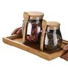 Venta al por mayor del fabricante Tarro de almacenamiento de vidrio transparente para snacks Tapa de madera Tarro sellado para granos de vientre grande con cuchara Lata de té Embalaje