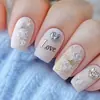 Nuevas uñas postizas hechas a mano de alta costura para otoño e invierno Patrón de amor tridimensional para el Día de San Valentín se puede vender al por mayor