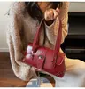 2025 Hebilla de Cinturón de Moda de Color Sólido Tendencia Bolso de Motocicleta Bolso de Hombro Individual Debajo del Brazo Bolso de Hombro Cruzado Versátil Elegante