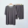 Pijama Sem Costura de Seda Gelada para Homens e Mulheres, Novo Estilo de Verão para Casais, Ultra-Fino e Confortável, Gola Redonda, Manga Curta Canelada Conjunto de Roupa Casual