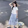 Verano 2026 Nuevo Estilo Camisa Polo Manga Corta Estilo Universitario Coreano para Niñas Falda de Encaje Dulce y Linda Conjunto de Dos Piezas