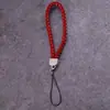Lanyard para teléfono móvil al por mayor de fábrica, cordón para llavero de cámara de cuero PU, cuerda de muñeca para teléfono móvil de pareja, cuerda tejida de cuero