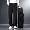 Pantalones de chándal gruesos y forrados de forro polar para hombre para otoño e invierno, adecuados para hombres de mediana edad, corte holgado, talla grande, pantalones casuales de pierna recta