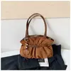 Bolsa de ombro retrô elegante e de alta qualidade, nova para 2026, de grande capacidade para o dia a dia, com um design de bolsa tote descontraído, plissado e de cor sólida