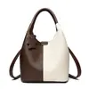 Bolso de mujer transfronterizo 2026 nueva moda versátil con bloques de color tipo cesta bolso de mano elegante bolso de hombro cruzado