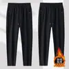 Envío RápidoPantalones de hombre con forro polar de invierno, con cremallera lateral, múltiples bolsillos, cintura alta elástica, corte holgado, pants deportivos, pantalones de deporte