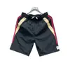 Verano 2026 Nuevo Estilo Japonés Simple Color Sólido Secado Rápido Pantalones Cortos Finos para Hombre Casual Cintura Elástica Holgados de Cinco Puntos