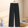 Calça da mamãe, coleção de outono, cintura elástica, calça pantalona, novo estilo 2026, calça reta outono/inverno, calça estilosa e casual para mulheres de meia-idade e idosas