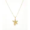 Collar Cruz Acero Inoxidable Temperamento Moda Versátil Serie Océano Estrella de Mar Perla Incrustada Chapado en Oro de 18K Sentido del Diseño