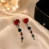Pendientes de estilo punk oscuro gótico retro transfronterizos, pendientes de borla rojos dulces y geniales de chica hot, pendientes de la serie de Halloween