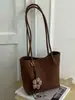 Bolsa tote de nicho transfronteiriça para o dia a dia, bolsa de ombro casual, estilosa e de aparência sofisticada, bolsa de grande capacidade para o trabalho