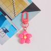 Llavero con forma de flor pequeña de resina colorida para mujer, estilo Ins, bonito colgante para bolso, accesorio para colgar auriculares, decoración para bolso.