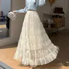 Roupas femininas: Saia plissada em malha bufante, cintura alta, caimento em A, modelagem solta, barra larga, saia em camadas para mulheres no outono
