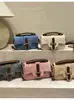Bolso cuadrado pequeño minimalista 2026 nuevo bolso cruzado transfronterizo para mujer, bolso de hombro de alta gama, bolso de nicho coreano para mujer