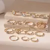 Conjunto de anéis geométricos, em forma de coração, vazados, cravejados de diamantes, best-seller europeu e americano transfronteiriço, uma coleção luxuosa e de alta qualidade de 15 peças para mulheres