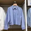 26 Otoño Nuevo Estilo Tela Oxford Cuadrado Holgado Solapa Manga Larga Camisa Camisa de Aire Acondicionado Top Mujer Y488520