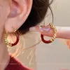 Pendientes Navideños Rojos Dorados y Plateados Empalmados para Mujer 2025 Nuevo Estilo Caliente Pendientes de Lujo Ligero Gama Alta Accesorios Únicos para Orejas