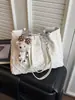 Bolso de mano simple para mujer 2026 nuevo modelo, lindo bolso tote para mujer, bolso de hombro para commuting de nicho de gran capacidad, bolso de mano versátil