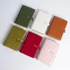Bolsa de Armazenamento de Joias em Forma de Livro de PU Bolsa de Armazenamento para Anéis, Colares e Pulseiras de Veludo Bolsa de Joias Portátil Pronta para Venda