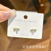 Aretes de mini corazón con zirconita incrustada de una flecha atravesando el corazón aretes de temperamento fresco y simple aretes pequeños y exquisitos aretes de plata