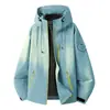 Traje de asalto para exteriores color camello mismo estilo tres en uno para mujer cortavientos impermeable forro de plumón carcasa rígida chaqueta de ropa de montañismo hombre