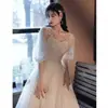 Vestido de novia ligero 2026 nuevo modelo para compromiso y registro, bata de mañana de color liso para fotografía de viaje, cuello en V, mangas cortas abullonadas, largo hasta el suelo, nicho de lujo ligero
