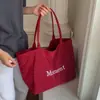 Bolso de Hombro Versátil Nuevo de Nicho Bolso Tote Estilo Coreano para Mujer Versátil Gran Capacidad Letra Bolso Casual 2026 Para Viajar al Trabajo