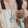 Espíritu inspirado en el bosque~Nuevo collar con colgante de madera de roble estilo Zen chino para mujer, diseño de nicho, accesorio de cadena larga para suéter