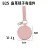 Espejo de cuero grueso en stock con gancho para colgar, se puede usar como accesorio de bolso, espejo de maquillaje redondo de cuero de color sólido, personalizable