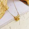 Nuevo Set de Joyería de Moda Transfronteriza de Acero de Titanio de Alta Gama con Lazo Color Dorado de 18 Quilates Acero Inoxidable que Conserva el Color Decoración
