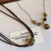 Collar de Cuero con Cuentas Ojo de Tigre para Mujer Otoño e Invierno Vintage Lujo Ligero Gama Alta Nicho Versátil Cadena de Lana Maillard Tendencia
