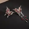 Brincos de borla assimétricos de borboleta líquida de agulha de prata, design leve e luxuoso, estilo doce e descolado, brincos de moda para todos os gostos