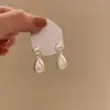 Brincos de Prata 925 com Agulha Pérola Metal Escovado Franja Gota d'Água 2025 Novo Estilo Quente Brincos Elegantes de Alta Qualidade