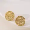 Pendientes redondos texturizados geométricos simples y exquisitos de moda transfronteriza europea y americana con un diseño versátil de lujo ligero de alta gama