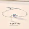 Pulsera Planeta Piedra Lunar para Mujer Tendencia Estilo Mori Fresco Diseño Nicho Pulsera de Borlas Ajustable Regalo Elegante