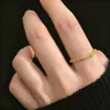 Anillo de cadena blanda brillante transfronterizo europeo y americano para mujer, anillo de metal versátil de moda de alta gama, anillo liso apilable para mujer