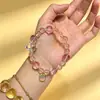Sutra del Corazón Templo Rosa Mostrador de Circulación con Pulsera de Tesoros Múltiples Glaseada Blanca Pulsera de Escrituras Libro Rojo Pequeño Rosa Artículo Popular
