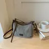 Bolsa de palha tecida casual para o dia a dia Shuai Mi Jia para mulheres, novo estilo outono 2026, bolsa de ombro e transversal de moda nicho