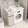 Gabinete de lavandería para balcón de aluminio tipo panal con lavadora integrada, incluyendo una tabla de lavar y un fregadero de piedra de cuarzo artificial con una barrera de agua