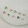 Paquete de material para manicura 2024 primavera y verano nuevo estilo mono mismo estilo hacha Corazón Torcido Cristal K9 diamante flash manicura al por mayor