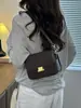 Elegante y estilosa bolsa de axila para mujer de piel genuina, modelo nuevo, bolsa de tofu a la moda y versátil para el trabajo, bolso de hombro y cruzado