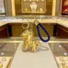 2026 Año del Caballo Dibujo Animado Pony Llavero Colgante de Bolso Zodiaco Caballo de la Riqueza Colgante de Lámina de Oro Regalo Creativo Al por Mayor